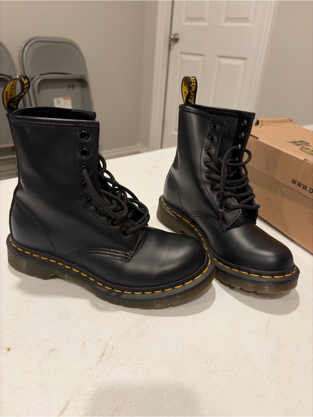 Dr. Martens Black Leather 8-Eye Combat Boots with Yellow Stitching